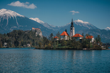 Bled, Slovenia - Aerial panoramic view of beautiful Bled Castle Blejski Grad with Lake Bled Blejsko Jezero , the Church of the Assumption of Maria and Julian Alps at background on a nice summer day