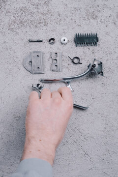 old hair clipper, disassembled into parts