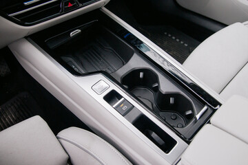 Car interior console: storage and control panel