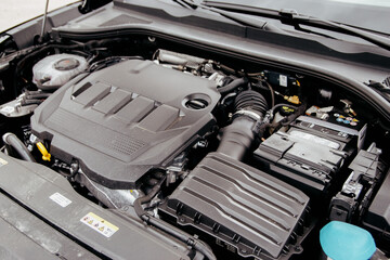 Car Engine View: A detailed shot of an automotive engine showcasing its complexity and design Car...