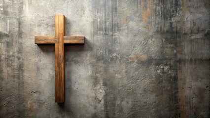 A weathered wooden cross stands alone against a textured concrete background, symbolizing faith and hope.