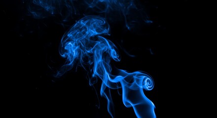 Fototapeta premium Blue smoke swirls elegantly against a stark black background creating drama