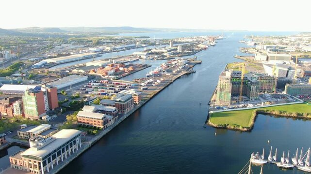 Aerial view on Lagan river and buildings in City centre of Belfast Northern Ireland. Drone photo, high angle view of town