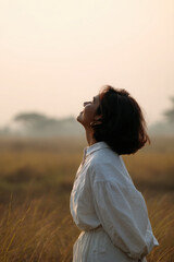 Obraz premium serene scene person inhaling fresh morning air surrounded by nature