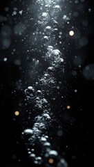 Obraz premium Rising bubbles in dark water, sparkling background, underwater scene, science or abstract use