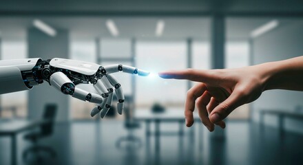 A robot and human hand touching fingers with a light effect in a bright modern office space