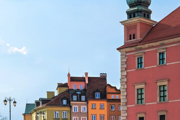 Warsaw, Poland - April 13, 2024. Historic Old Town in Warsaw with Vibrant Buildings and Blue Sky