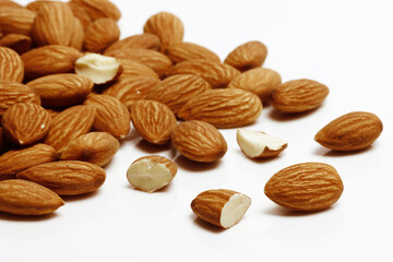 Several Fresh Almonds on white background
