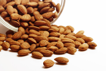 Several Fresh Almonds on white background