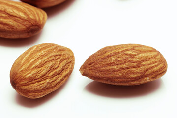 Several Fresh Almonds on white background