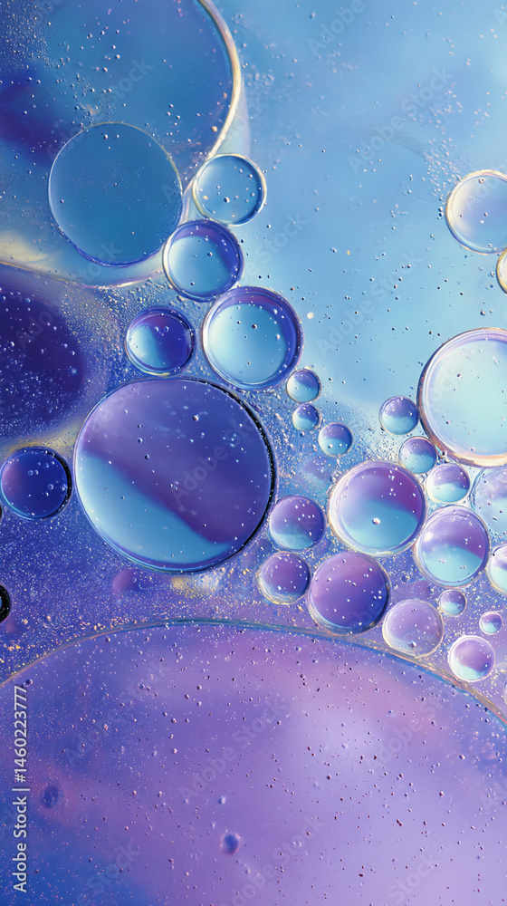 Poster abstract image of blue and purple oil bubbles in water, creating a dreamy, ethereal effect, showcasi