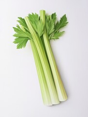 Crisp green celery stalks with leafy tops arranged on a clean white background, ideal for healthy food and nutrition concepts.
