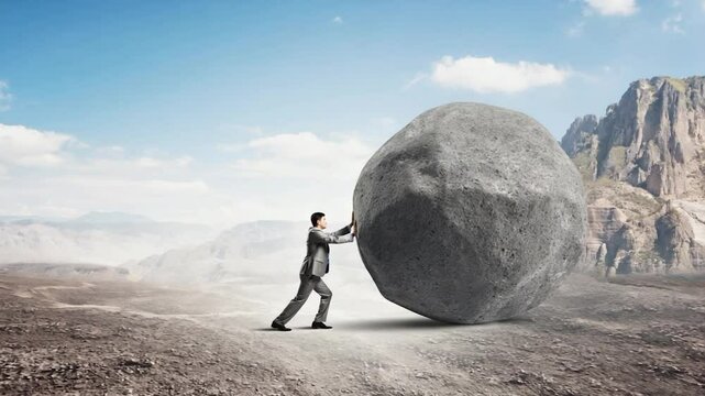 Businessman pushing large boulder, desert landscape, motivational concept, stock image