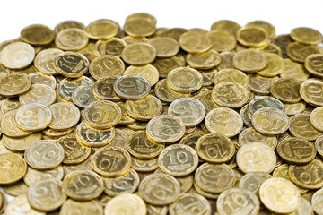 Pile of Ukrainian 10 kopiyok coins, symbolizing economy, finance, and savings.