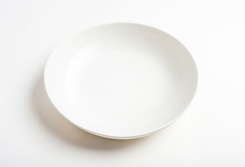 A blue and white bowl on a white surface.