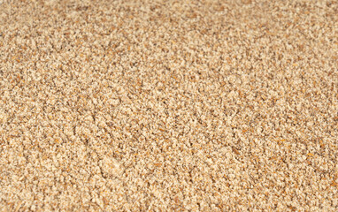 Milk thistle seeds powder, crushed silybum marianum grains pile, milled dry blessed milkthistle