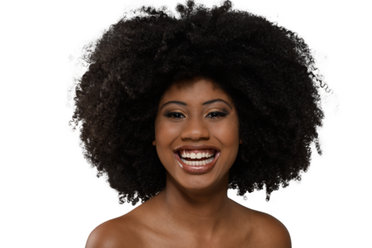 Smiling woman with a voluminous afro hairstyle