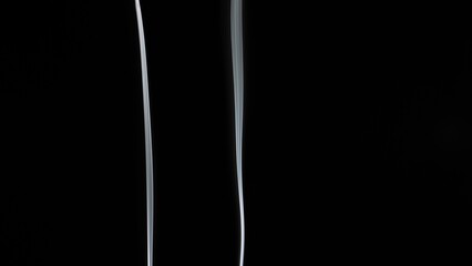 Elegant Smoke Patterns on a Dark Background Photography Art