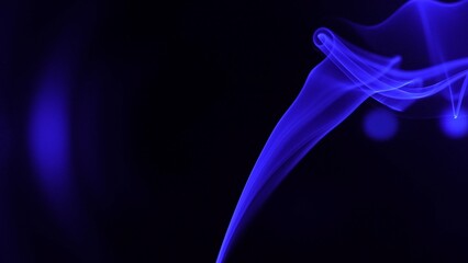 Abstract Blue Smoke on a Dark Black Background