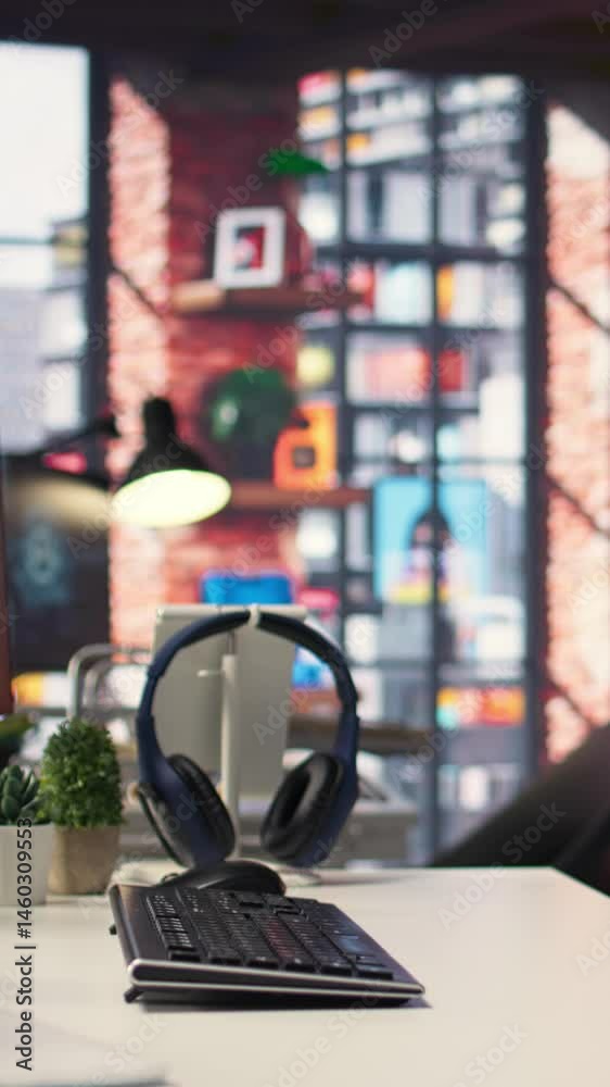 Poster vertical video office desktop setup includes monitors displaying terminal interfaces and ai systems.