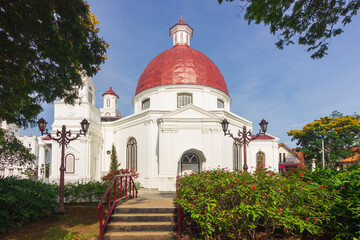 View of Gereja Blenduk, showcasing its unique architecture and historical charm, against a clear blue sky, located on Kota Lama, Semarang