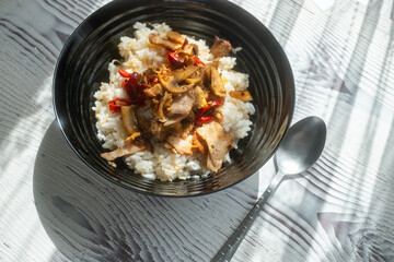 Soy sauce chicken rice on restaurant plate