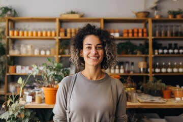 Fototapeta premium portrait of a Smiling customer standing by rack at zero waste store