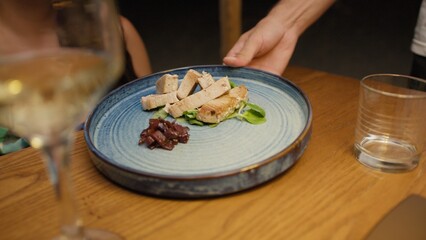 Waiter Serving The Tuna Dish For The Perfect Gourmet Dinner At The Restaurant 