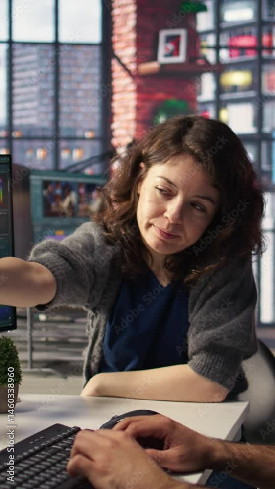 Poster vertical video photographers team collaborating on ai generated material using text to image tools. 