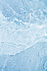 Splash cosmetic moisturizer water micellar toner or emulsion  blue colored abstract background