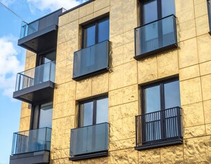 Fototapeta premium Abstract bokeh background with vibrant blue, yellow, and orange circles. Perfect for festive designs, wallpapers, and presentations.