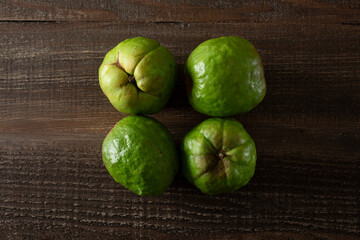 A top down view of some large white guava fruit.
