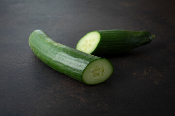 A view of a halved English cucumber.