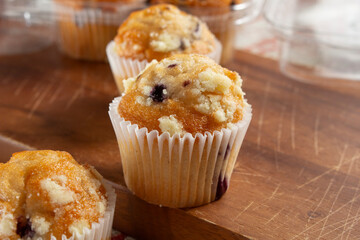 A view of several blueberry mini muffins.