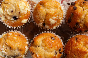 A top down view of some mini muffins in a package.