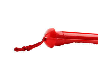 Iconic lifeguard equipment including a red rescue float and whistle used in coastal patrol duties isolated on white background PNG