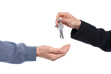 Real estate agent giving house key to new owner on white background, closeup