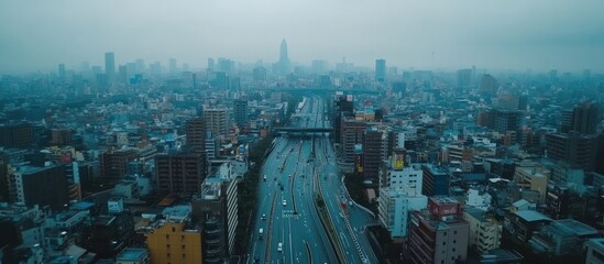 Cityscape with Highway and Buildings Under a Cloudy Sky
