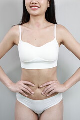 A confident woman embraces her natural beauty and body shape, celebrating skincare, health, and self-love in a diverse, body-positive lifestyle.