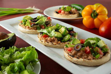 A view of a platter of sopes.