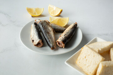 A view of a plate of canned sardines.