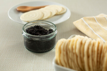 A view of a jar of vegan seaweed caviar.