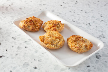 A view of a tray mini apple pies.