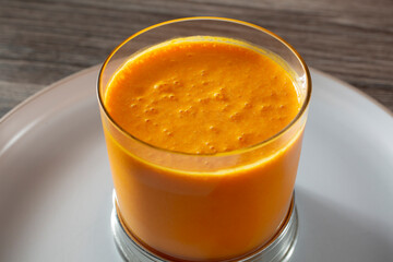 A view of a mango lassi drink.
