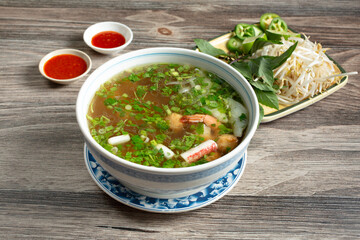 A view of a bowl of seafood pho. © DAVID