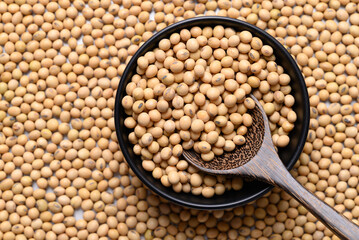 Soybean seeds in bowl with spoon, Food ingredient, Top view
