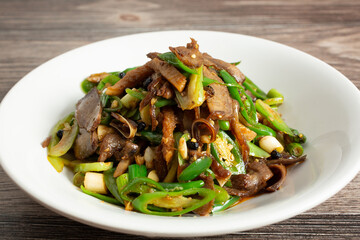 A view of a braised beef tongue entree.