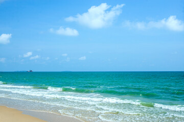 Landscape. View of the sea and blue sky with bach and waves