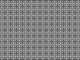 Black and white floral tiles in a repetitive symmetrical arrangement with a classic touch. Inspired by vintage ceramic motifs. Great for wallpaper or elegant book covers.
