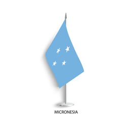 Micronesia table flag on light grey background. Micronesia desk flag isolated on grey background	